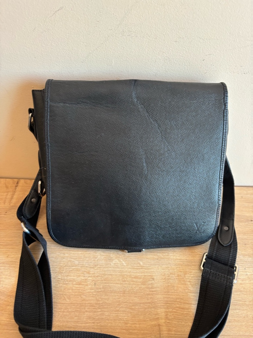 Authentic Louis Vuitton black taiga messenger bag